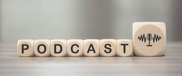 Wooden blocks with symbol of podcast concept - Foto, Imagen