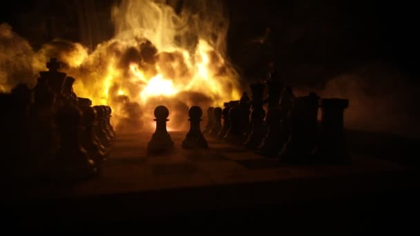 Concept of war or manipulation with global politics. War between Russia and Ukraine, conceptual image of war using chess board and national flags on the background of explosion. - Footage, Video
