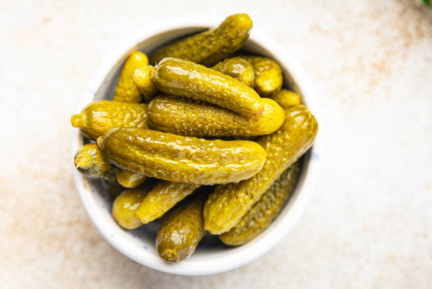 gherkins cucumber salted pickled vegetable food meal snack on the table copy space food background  - 写真・画像