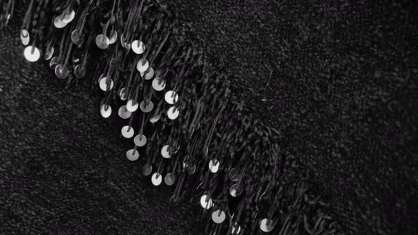 Traditional Moroccan wool fabric, blanket in black with silver paillettes, sequin. Can be used as throw or bedcover. 4k footage. - Záběry, video