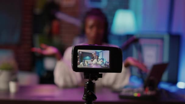 Selective focus on digital video camera screen recording african american woman streaming live internet show - Video, Çekim