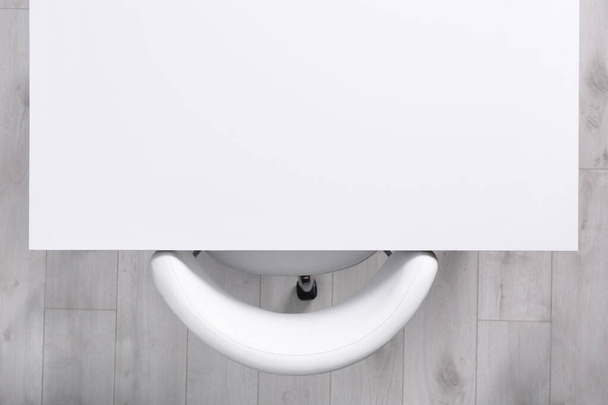 Empty white desk and chair indoors, top view - Photo, image