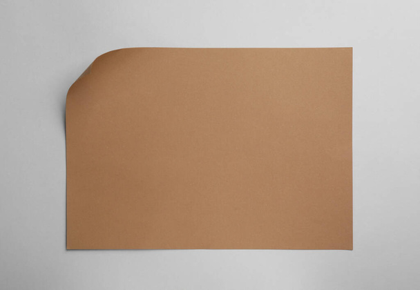Sheet of brown paper on white background, top view - Фото, зображення