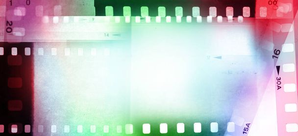 Colorful filmstrip negative frames background - Zdjęcie, obraz