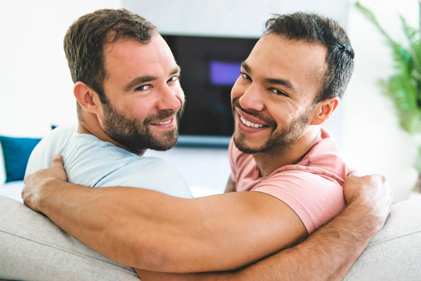 Portrait of a Cute Male gay Couple at Home - 写真・画像