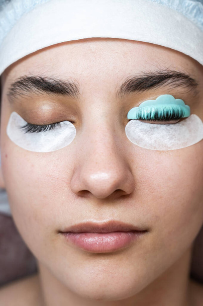 Caucasian woman on eyelash lamination procedure. Before and after.  - Foto, Imagem