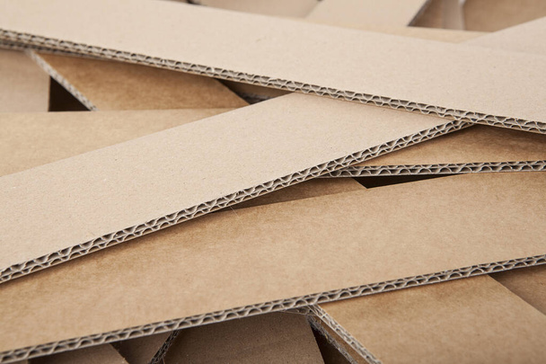 A stack of cardboard forms made of corrugated cardboard - Fotoğraf, Görsel