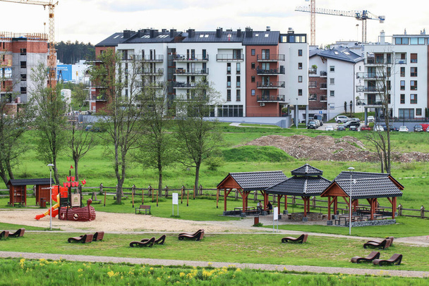 Public park close to the new housing estate under construction in Nowy Targ, Poland. - Zdjęcie, obraz
