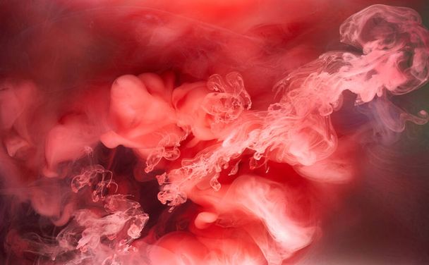 Black and red ink background, colorful fog, abstract swirling ocean, acrylic paint pigment underwater, white smoke - Φωτογραφία, εικόνα