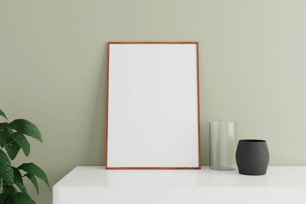 Minimalist and clean vertical wooden poster or photo frame mockup on the white table leaning against the room wall with vase and plant. 3D Rendering. - Foto, imagen
