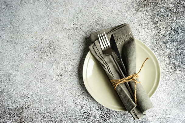 Minimlist dinner set on concrete background - Fotó, kép