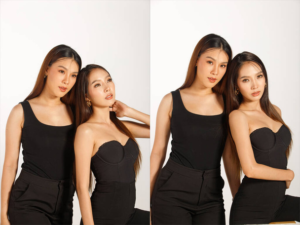 Kaksi Best Friends Half Body Muotokuva 20s Aasian kaunis Naiset musta pitkät suorat hiukset kuluvat musta mekko. Naaraat ilmaista tunne hymy onnellinen ja halata lähellä toisiaan yli valkoinen Tausta eristetty - Valokuva, kuva