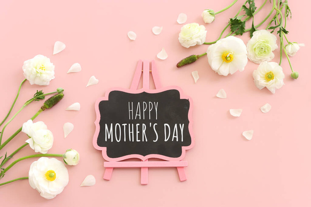 mother's day concept with pink flowers over pastel background - Fotoğraf, Görsel