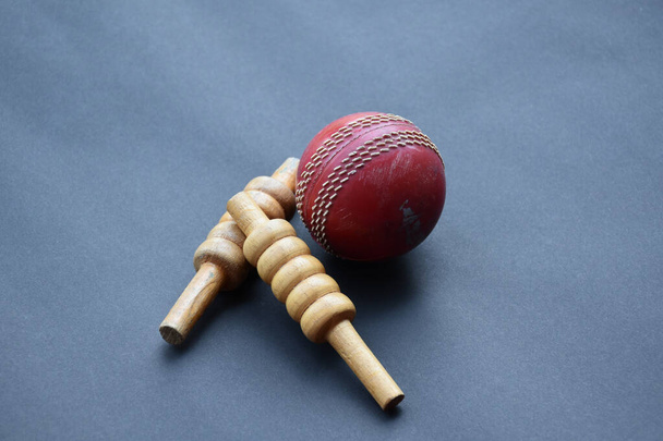 Old and used cricket ball on dark background used for cricket practice, soft focus. - Photo, Image