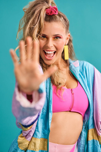 Stop playing it safe when it comes to fashion. Studio shot of a beautiful young woman wearing a 80s outfit. - Foto, imagen