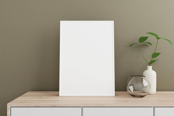 Minimalist and clean vertical white poster or photo frame mockup on the wooden table in living room with vase and plant. 3D Rendering. - Фото, изображение