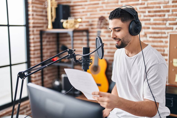 Young arab man artist singing song at music studio - Foto, afbeelding