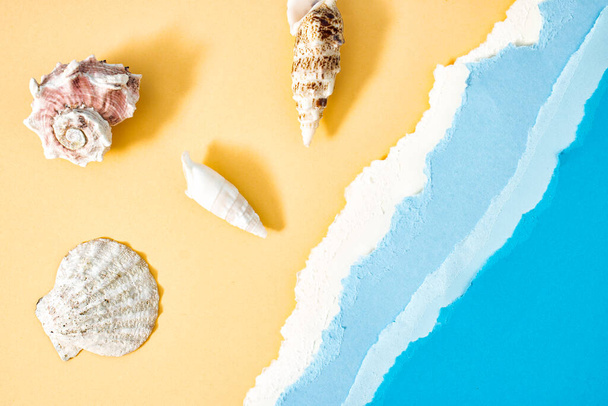 Summer beach creative background with copy space. Sunny day on the beach, sea and sand. Flat lay. - Foto, afbeelding