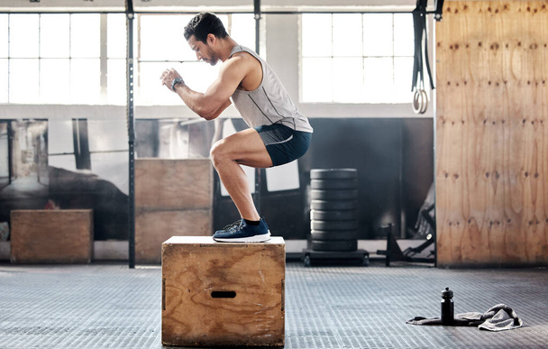 Dont skip leg day. Shot of a young man doing leg exercises at gym. - Foto, Bild