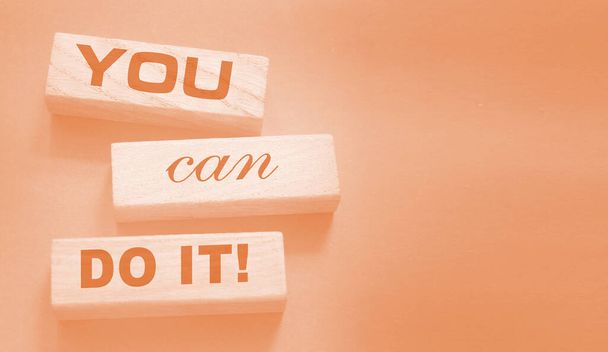 YOU CAN DO IT word on wooden blocks on neutral background. Business concept.. Motivation affirmation encouraging words for personal achievements concept. - 写真・画像
