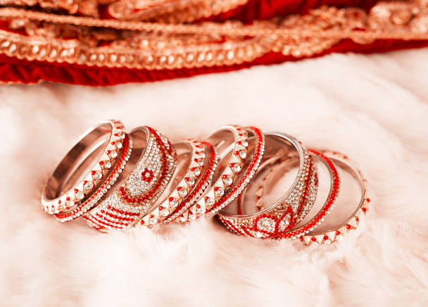 Glam up your look with these. Shot of beautiful bangles for a bride to wear at a traditional wedding. - Photo, Image