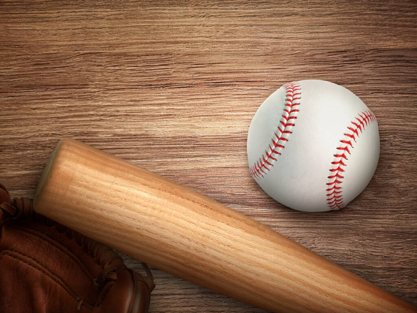 Baseball bat, glove and ball on wooden floor. Sport theme background with copy space for text and advertisment - Foto, immagini