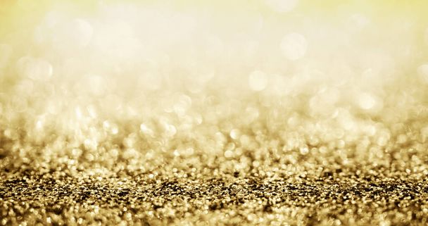 Brillo de brillo de oro abstracto borroso con fondo bokeh - Foto, imagen