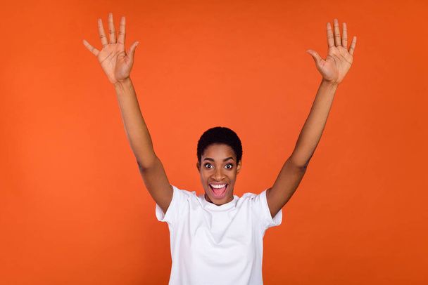 Photo of excited transgender lady hands up scream wear stylish trendy t-shirt isolated over vivid color background - Valokuva, kuva