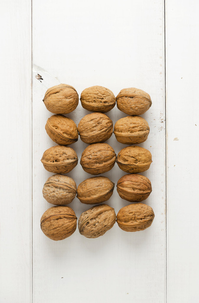 Walnuts arranged in rectangle shape - Valokuva, kuva
