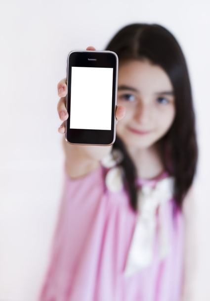 Little girl with modern touch white screen phone - Foto, imagen