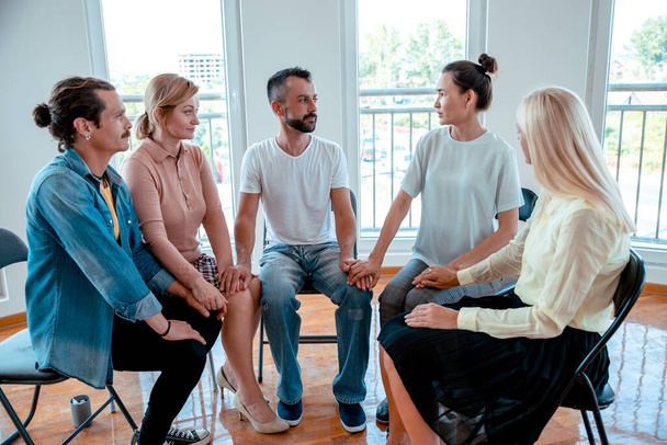 People have positive conversation on Support group talking about life. Diverse Millennial employees with new ideas on casual meeting - Φωτογραφία, εικόνα