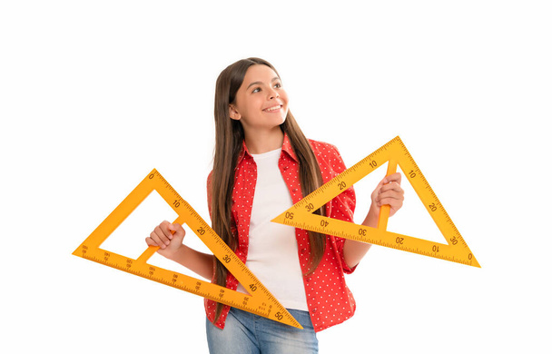 heureux enfant tenir triangle règle étude algèbre à l'école isolé sur blanc, retour à l'école - Photo, image