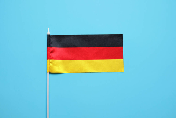 National flag of Germany on blue background - Valokuva, kuva
