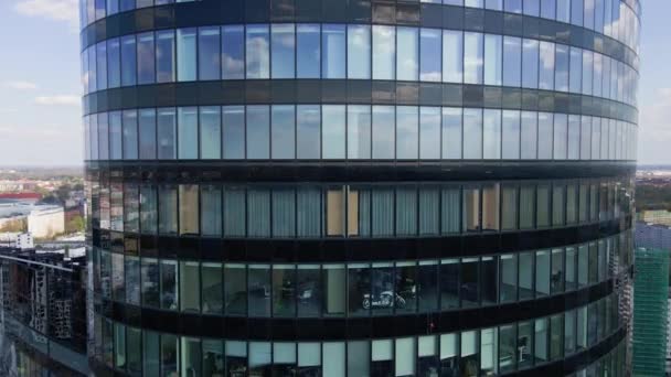 Aerial view of modern office building with big windows - Filmati, video