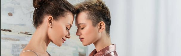 side view of young pansexual couple with closed eyes, banner - Foto, immagini