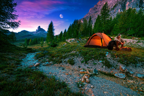 Hiker, campfire and tent - Photo, Image