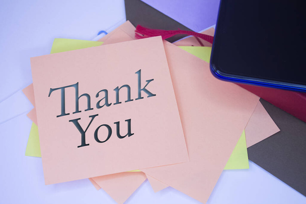 Thank You. Text on adhesive note paper. Event, celebration reminder message. - Foto, imagen
