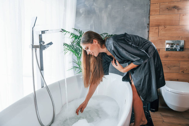 Beautiful young woman have free time at home in the bath. - Fotografie, Obrázek