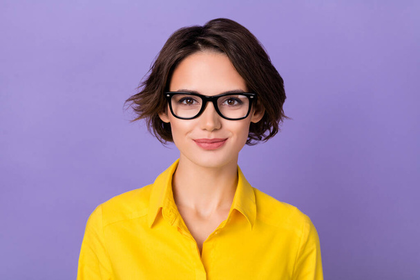 Photo of lovely millennial brunette lady wear eyewear yellow blouse isolated on violet color background - Zdjęcie, obraz