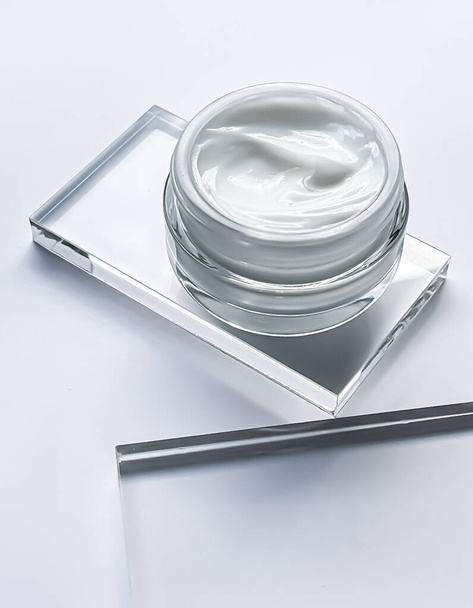 Face cream moisturiser jar and product sample on glass, beauty and skincare, cosmetic science concept - Photo, Image