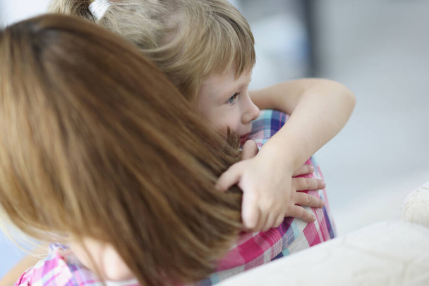 Mother and daughter hugging, mother comfort little kid, warm precious family moment - 写真・画像