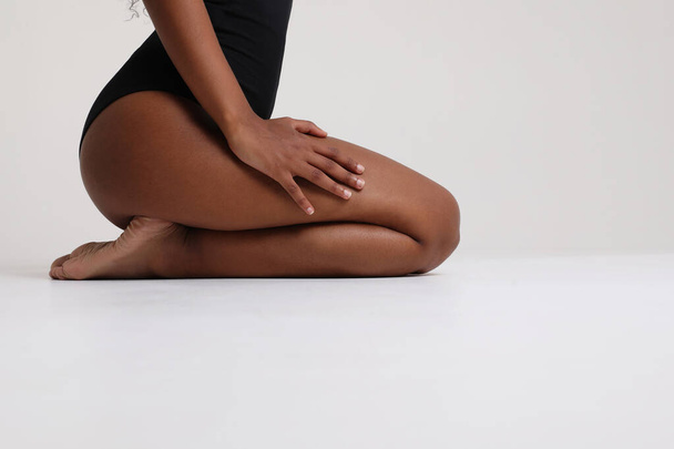 Body positive concept. Cropped photo of woman body part. Healthy legs. Mock-up. - Photo, Image