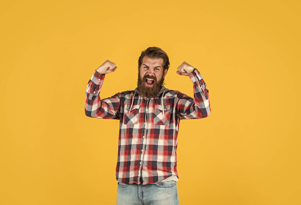 happy stylish bearded guy with trendy hairstyle wear checkered shirt, happiness - 写真・画像