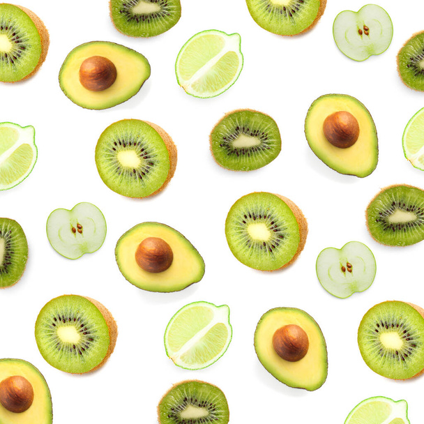 Set of cut green fruits on white background - 写真・画像