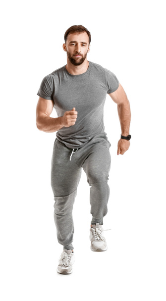 Coureur masculin sportif sur fond blanc - Photo, image