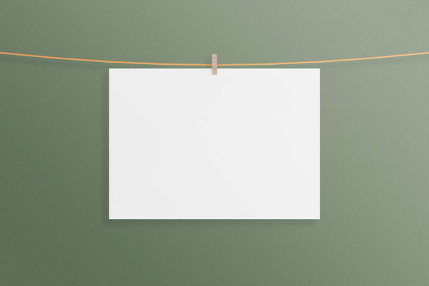 Minimalist hanging horizontal canvas poster or photo frame mockup in living room wall. 3D Rendering. - Фото, изображение