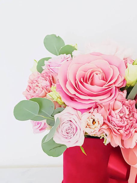 Beautiful bouquet of pink blooming flowers as holiday gift, luxury floral design concept - 写真・画像
