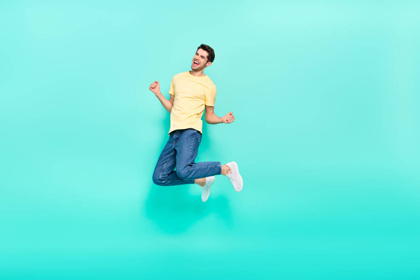 Full body portrait of satisfied glad man raise fists celebrate triumph isolated on teal color background - Foto, Bild