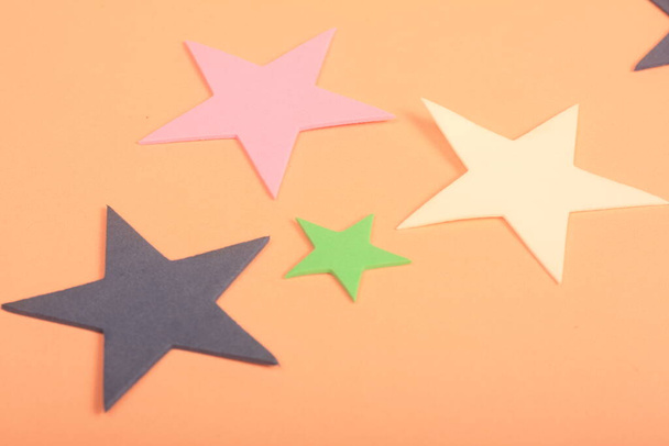 star shaped stars on a pink background. - Photo, Image