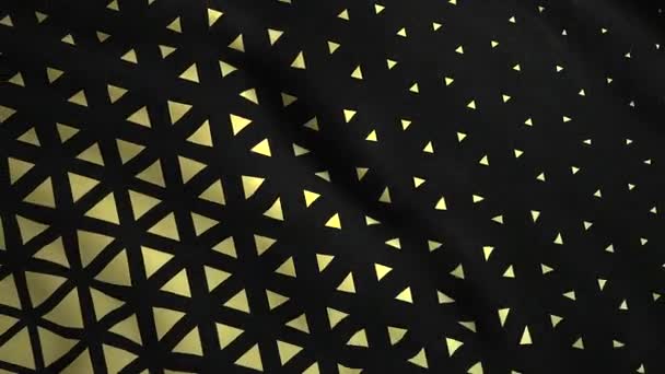 Textúra háttér sárga hullámzó háromszögek egy fekete háttér. Indítvány. Selymes ruha színes mintával lengett a szélben. - Felvétel, videó